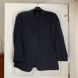 Men’s navy blue suit. Jacket 44R pants 36 x 32